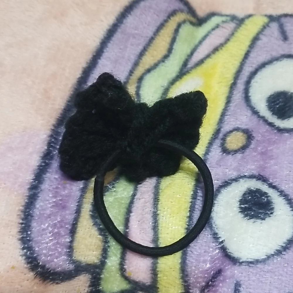 Handmade Black Crochet Bow with Villian Button